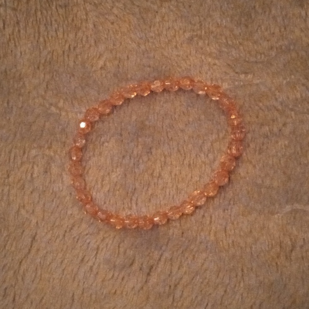 Minimalist handmade shiny and iridescent fun casual pale pink bracelet